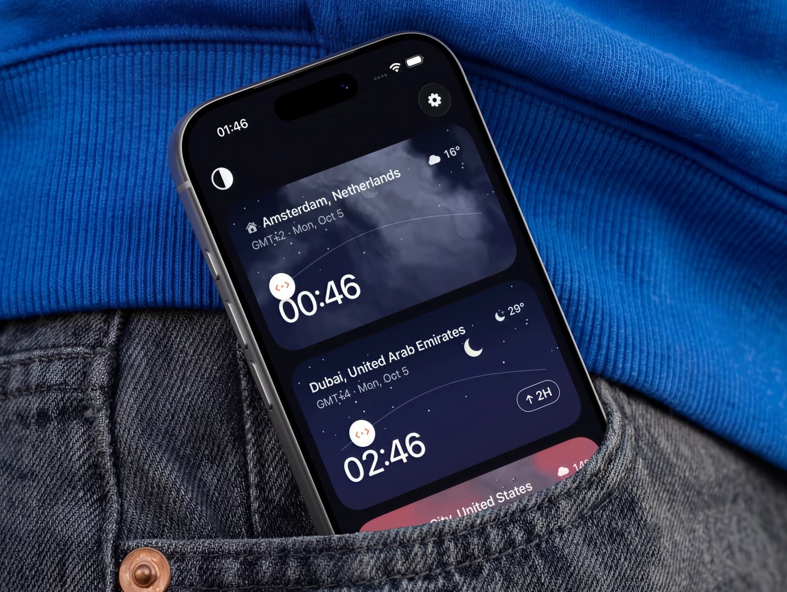 Timeslide world clock on an iPhone in a jeans pocket: cities as cards with local time