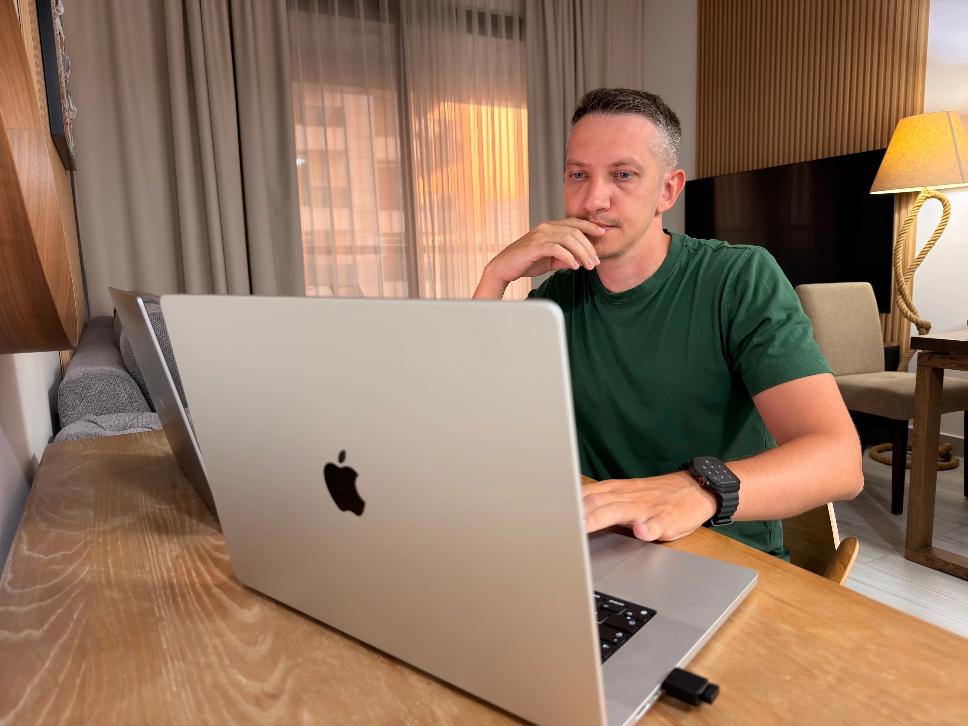 Alexander Vinokurov, founder of 99 Francs, working on a laptop